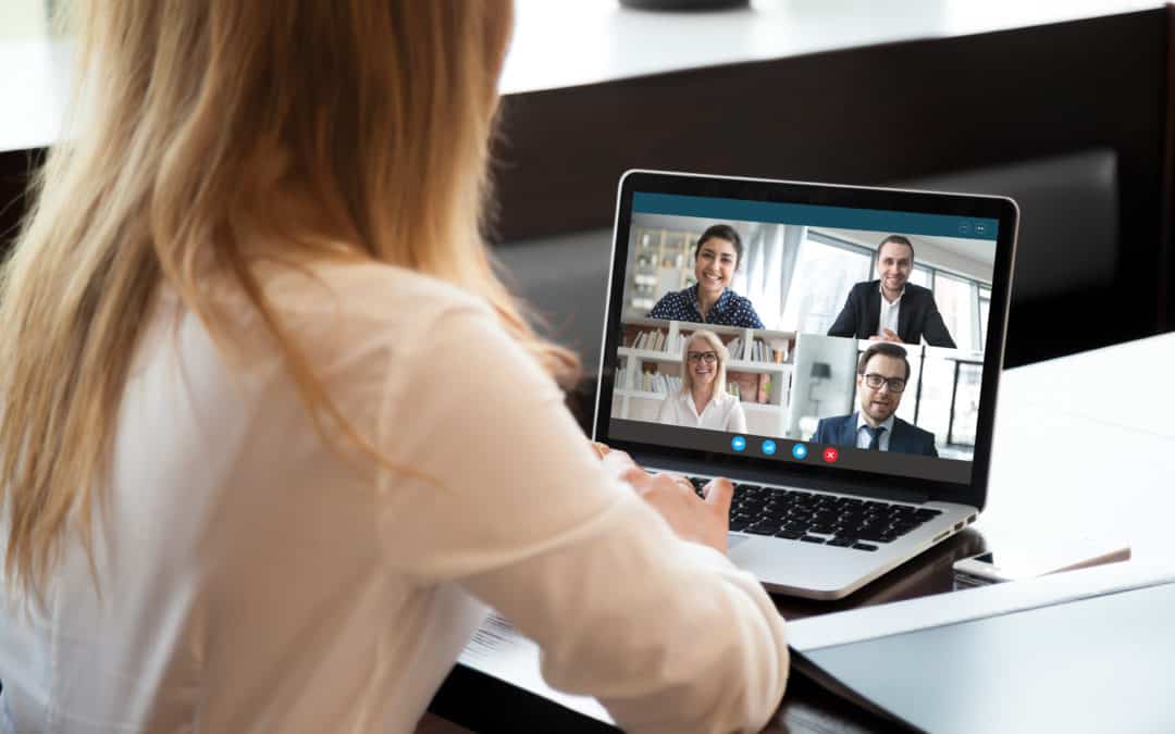 Woman communicating with her team virtually, on a conference call